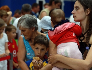 Беженцев из Украины через Крым направляют в другие регионы РФ