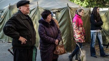 Немецкие СМИ: Киев не решает проблемы беженцев с юго-востока