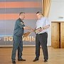 Глава МЧС России наградил Сергея Шахова военно-морским кортиком