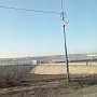 Вдоль дороги по шоссе Героев Сталинграда истрепались флажки