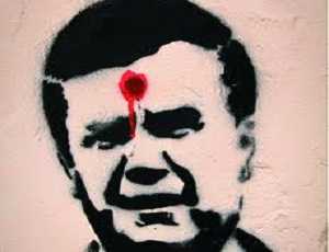 За граффити с простреленной головой Януковичем националистов посадили на два года