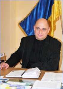 Задержанный за взятку мэр – поселковый голова Новоозерного Олег Курятенко