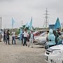 В Симферополе под ливнем отпраздновали День крымскотатарского флага