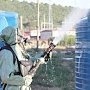 На учениях спасатели борются с химическим заражением на гидроузле