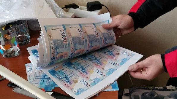 Фальшивомонетчики запустили в оборот миллиард рублей